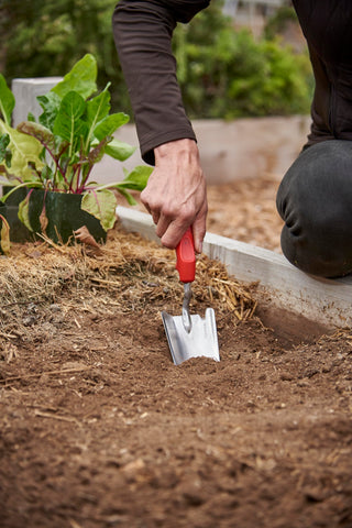 Corona Tools ComfortGEL grip in use during detailed bed prep and layout.