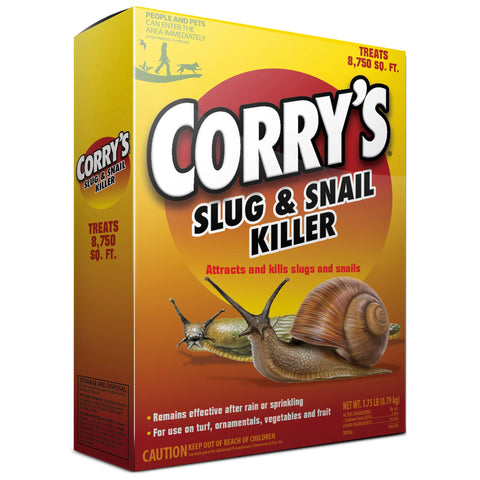 Corry's Slug Snail Killer bait pellets on soil surface for fast garden pest control