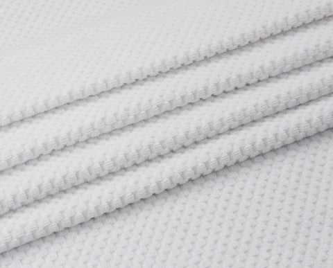 Cotton Craft soft plush lounge cover enhances poolside relaxation.