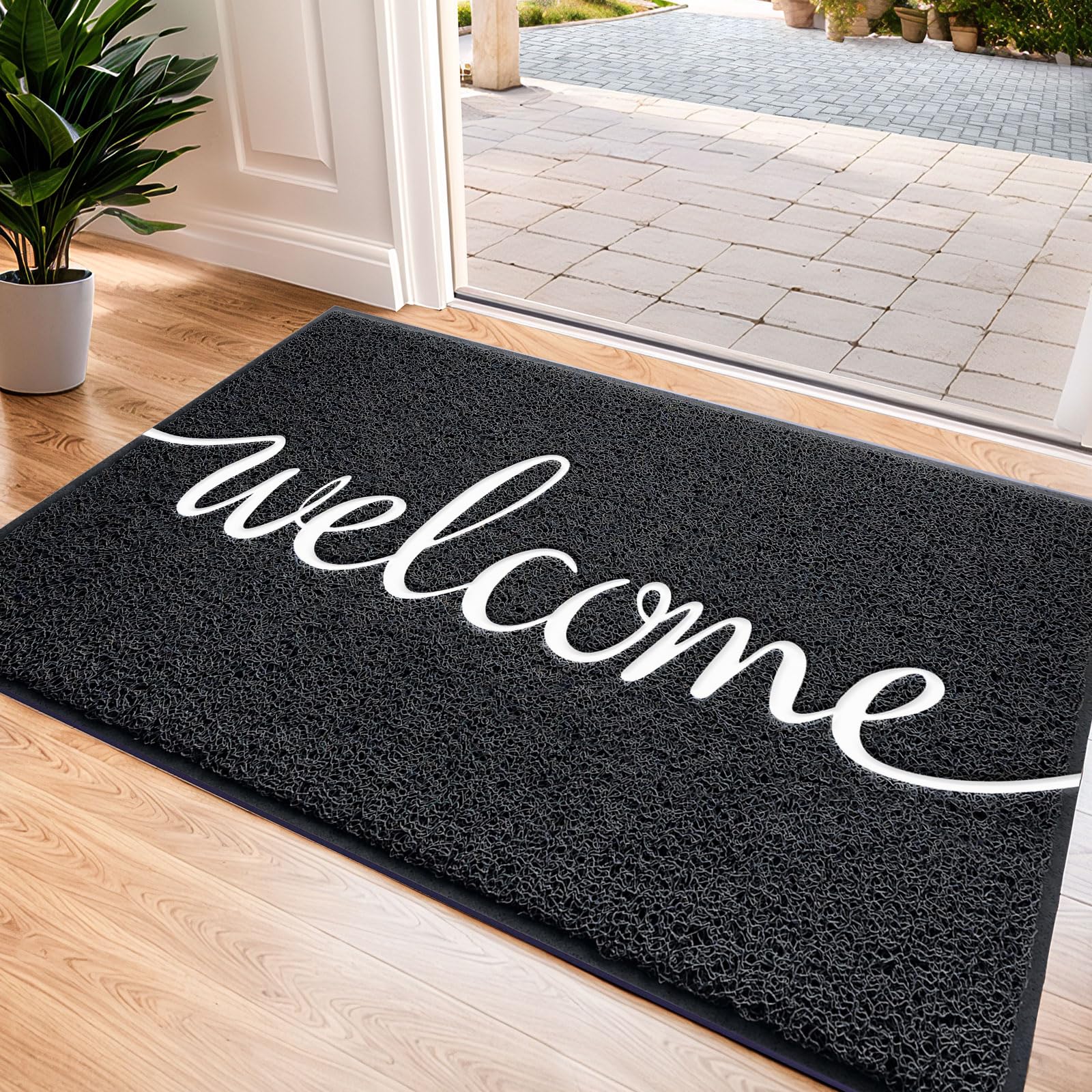 CozyBounty black door mat with welcome embossing for year-round use