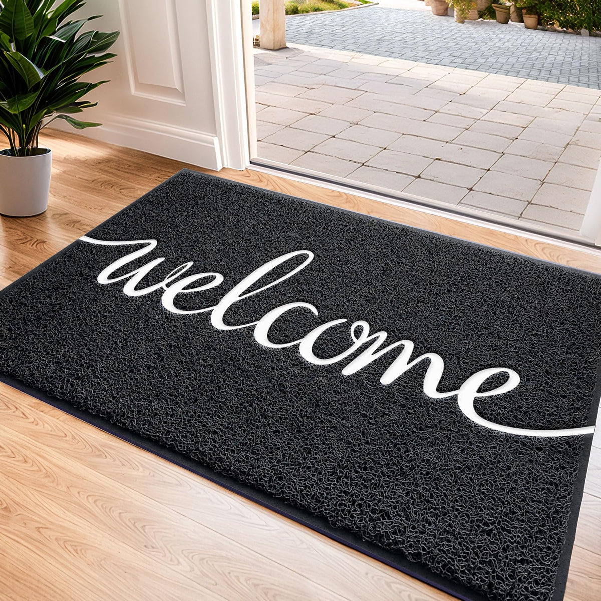 CozyBounty black door mat with welcome embossing for year-round use