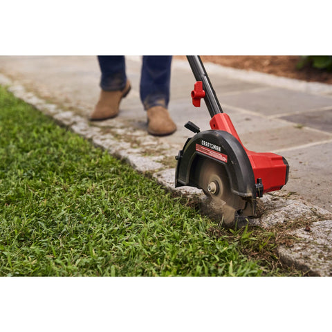 Craftsman 20V Edger edge guide in action along curb lines.