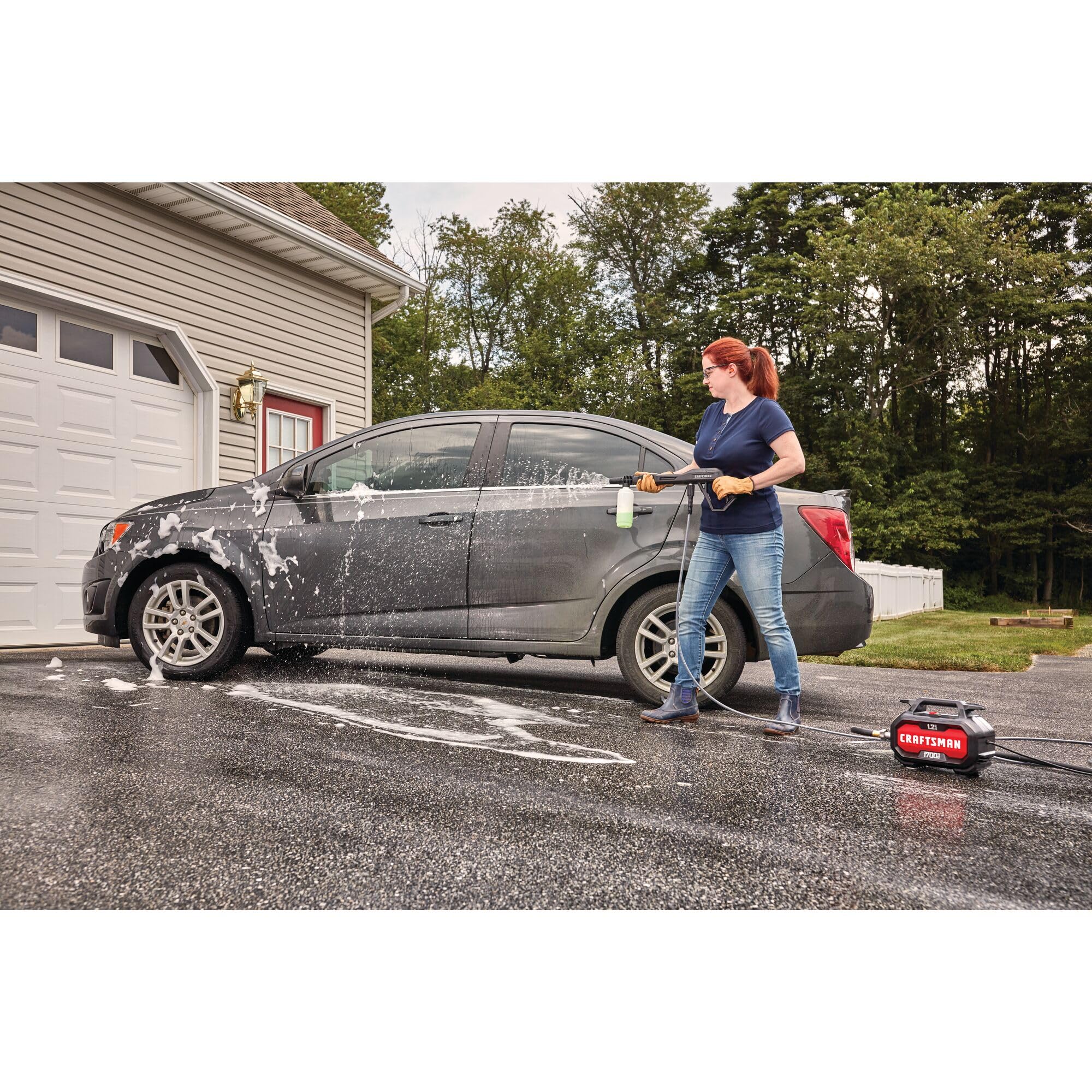 Cleaning a car with the Craftsman electric pressure washer for a refreshed finish.