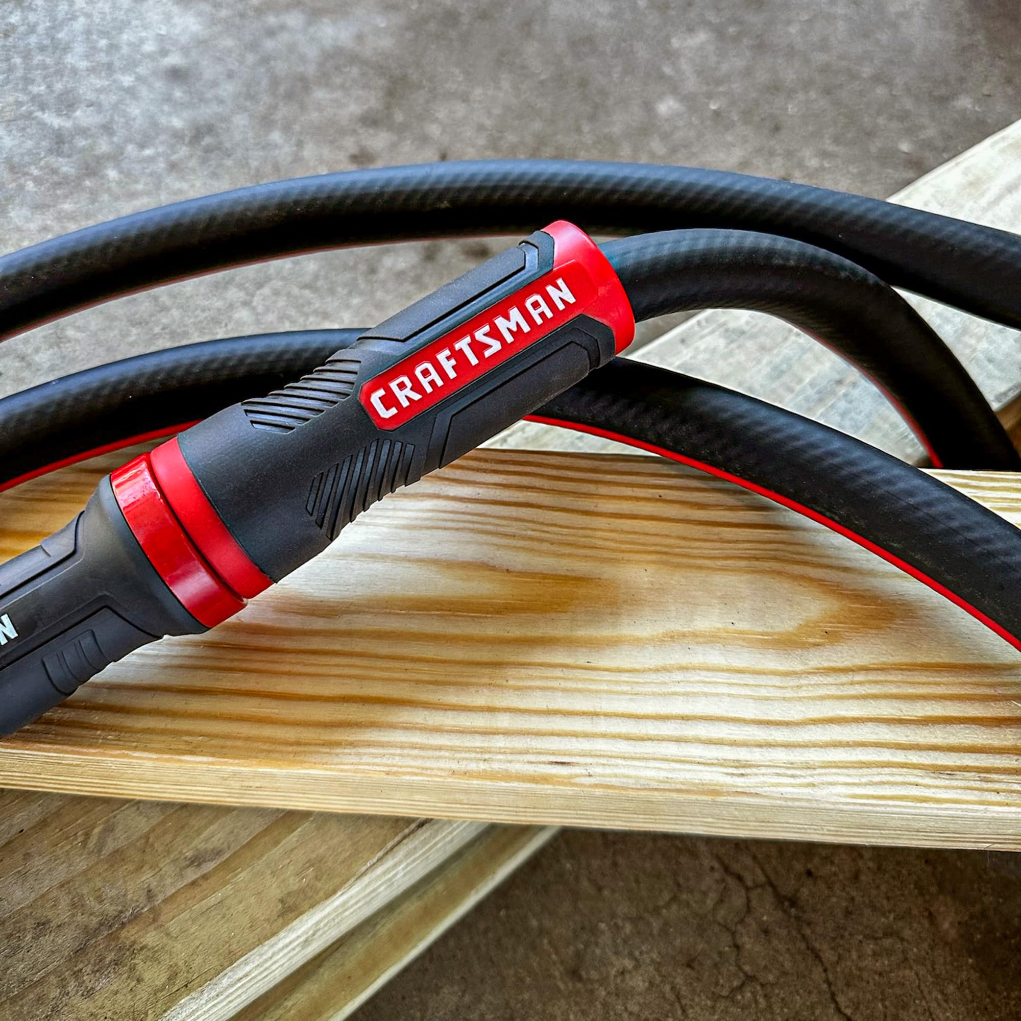 Craftsman hose in action delivering steady water flow across garden beds.