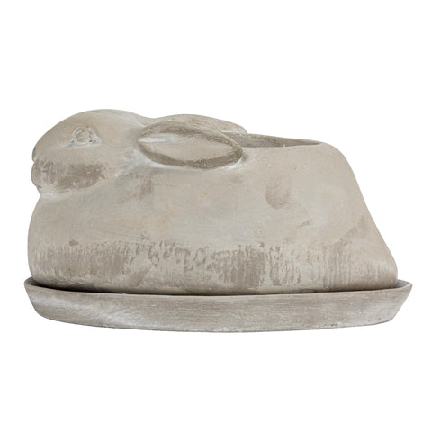 Creative Co-Op gray concrete rabbit creates outdoor appeal.