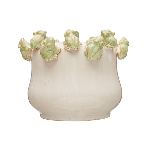 Sturdy stoneware construction supports live or faux greenery