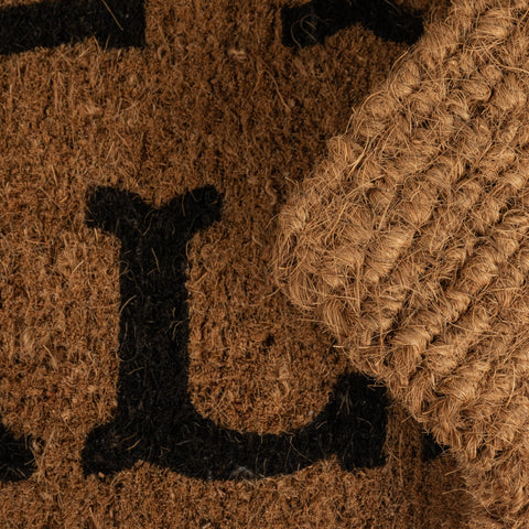 Creative Co-Op Hey Y'all Doormat vinyl backing keeps mat in place.