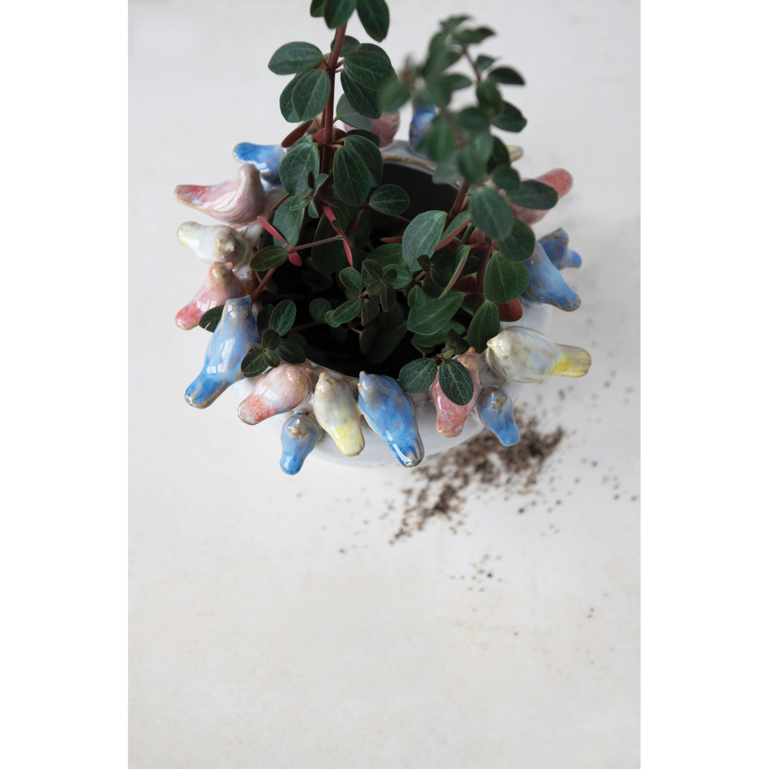Creative Co-Op planter without drainage holes suited for liners or pots.