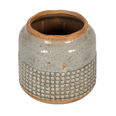 Creative Co-Op round terra-cotta hobnail planter vase with distressed finish adds rustic charm.