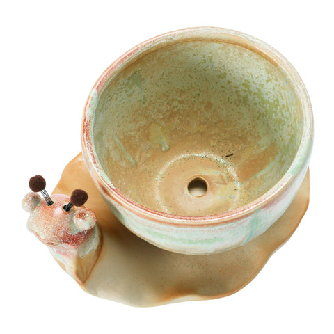 Set of two stoneware snail planters for versatile display