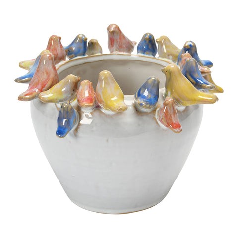 Creative Co-Op stoneware planter with birds on rim adds vibrant decorative charm.
