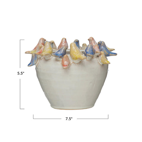 Creative Co-Op stoneware planter with reactive glaze delivers colorful texture.