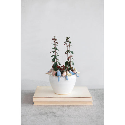 Creative Co-Op planter showing whimsical decor for cottage spaces.