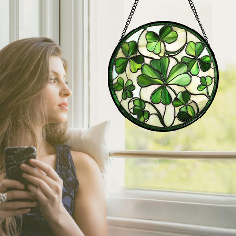 CRISGIF stained glass window hanging captures sunlight to create a warm color wash.
