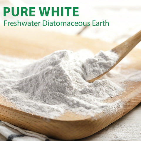 Crobirware Diatomaceous Earth used in garden beds for outdoor pest management.