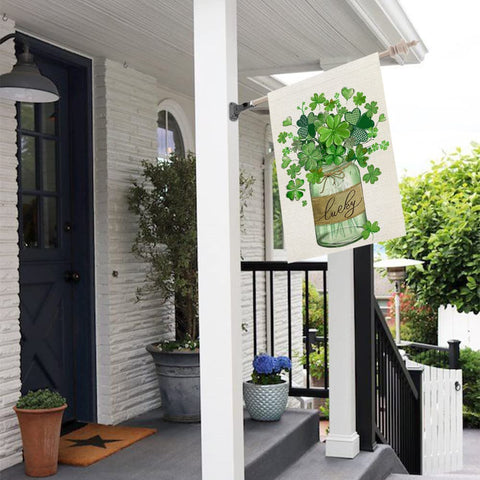 Crowned Beauty flag displayed in a yard for festive curb appeal.