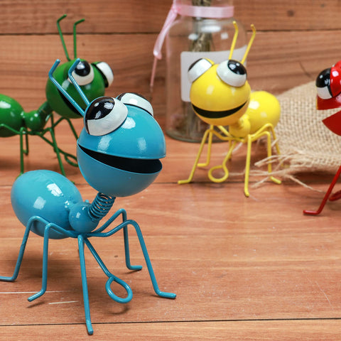 Cruis Cuka red metal ant yard art adds garden charm on hooks.