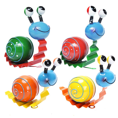 Cruis Cuka snail yard art yellow collection brightens garden spaces