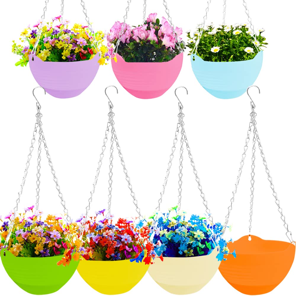 Cshangzei green self-watering hanging planter enhances indoor plant arrangement.