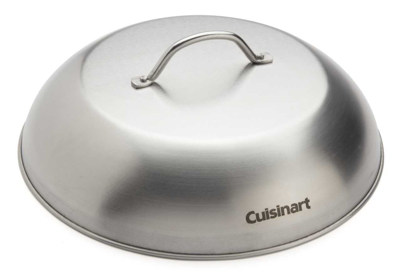 Cuisinart CMD-112 melting dome covers a grill, promoting even cooking and smoke infusion.