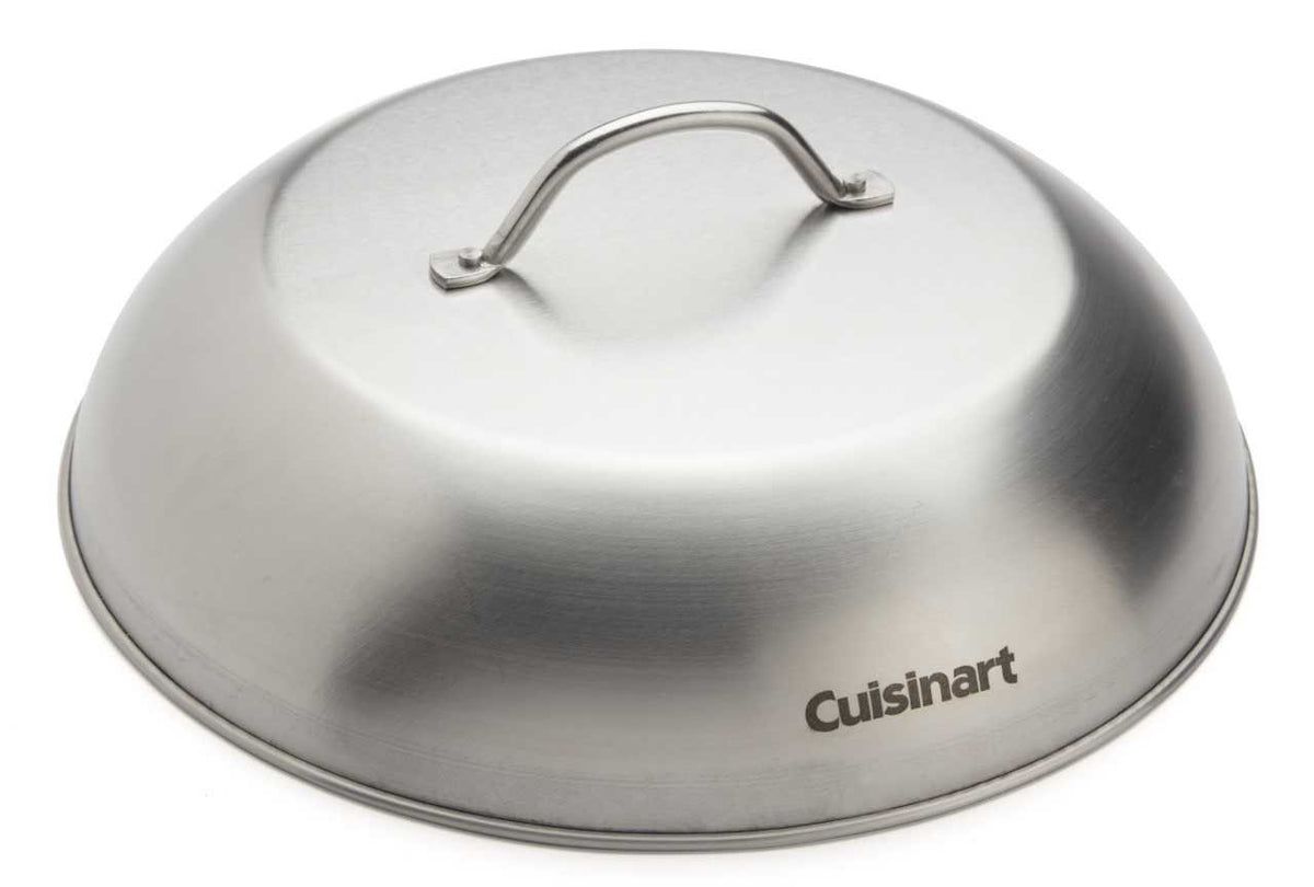 Cuisinart CMD-112 melting dome covers a grill, promoting even cooking and smoke infusion.