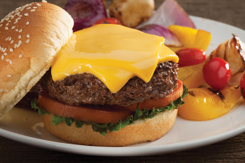Cuisinart CMD-112 melting dome on grill traps heat for even cooking and smoky flavor.