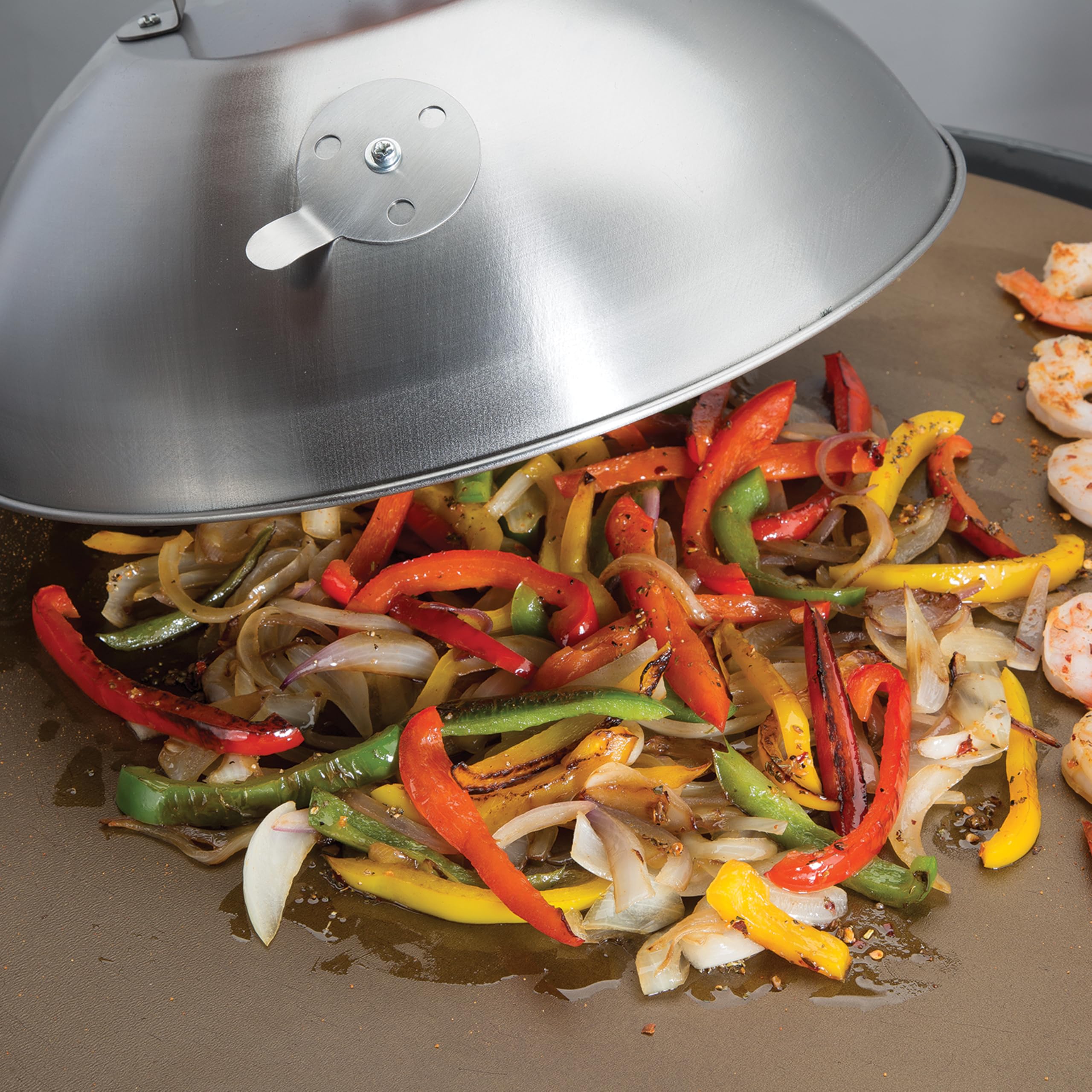 Cuisinart cheese-melting under heat with the dome delivers a smooth, even melt