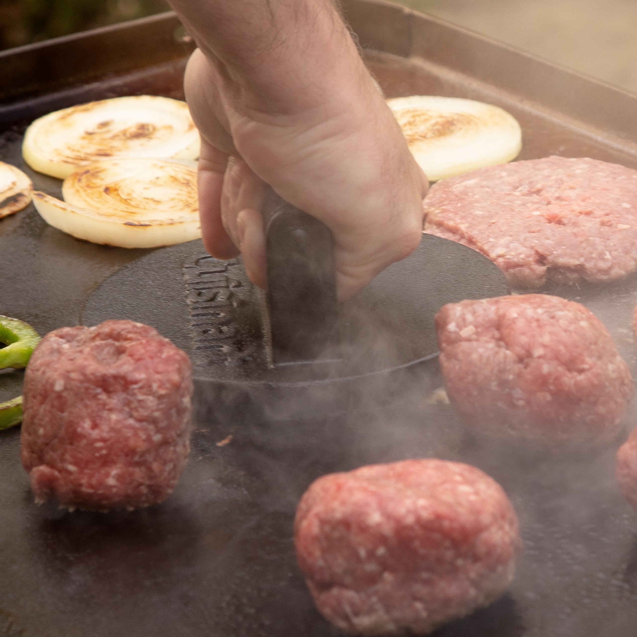 Cuisinart easy-clean hamburger smash tool for quick cleanup after grilling.