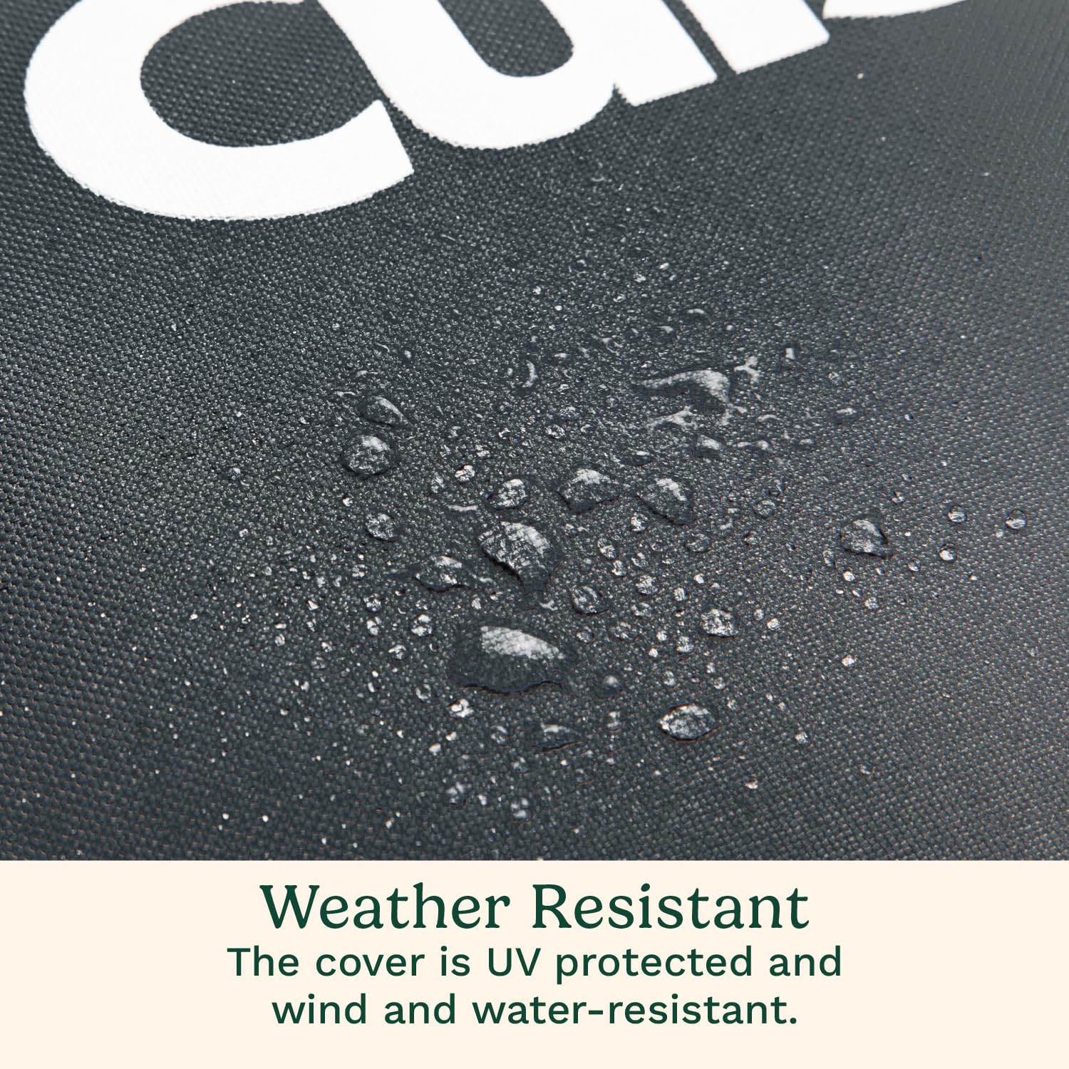 Cuisinart heavy-duty grill cover drawstring and buckle strap secure in wind.