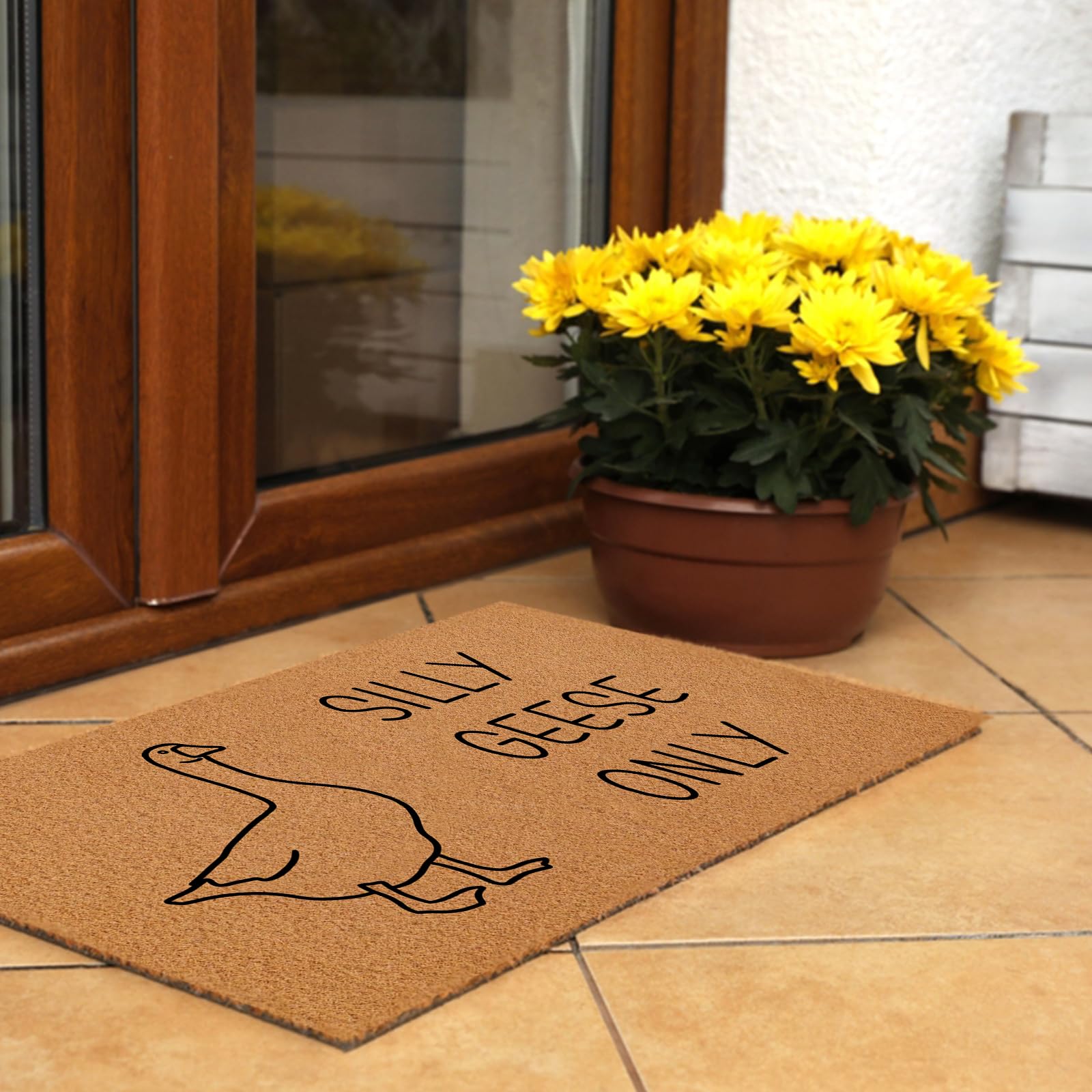 Cute Silly Goose Welcome Mat is easy to clean, shake out, or rinse with a hose.