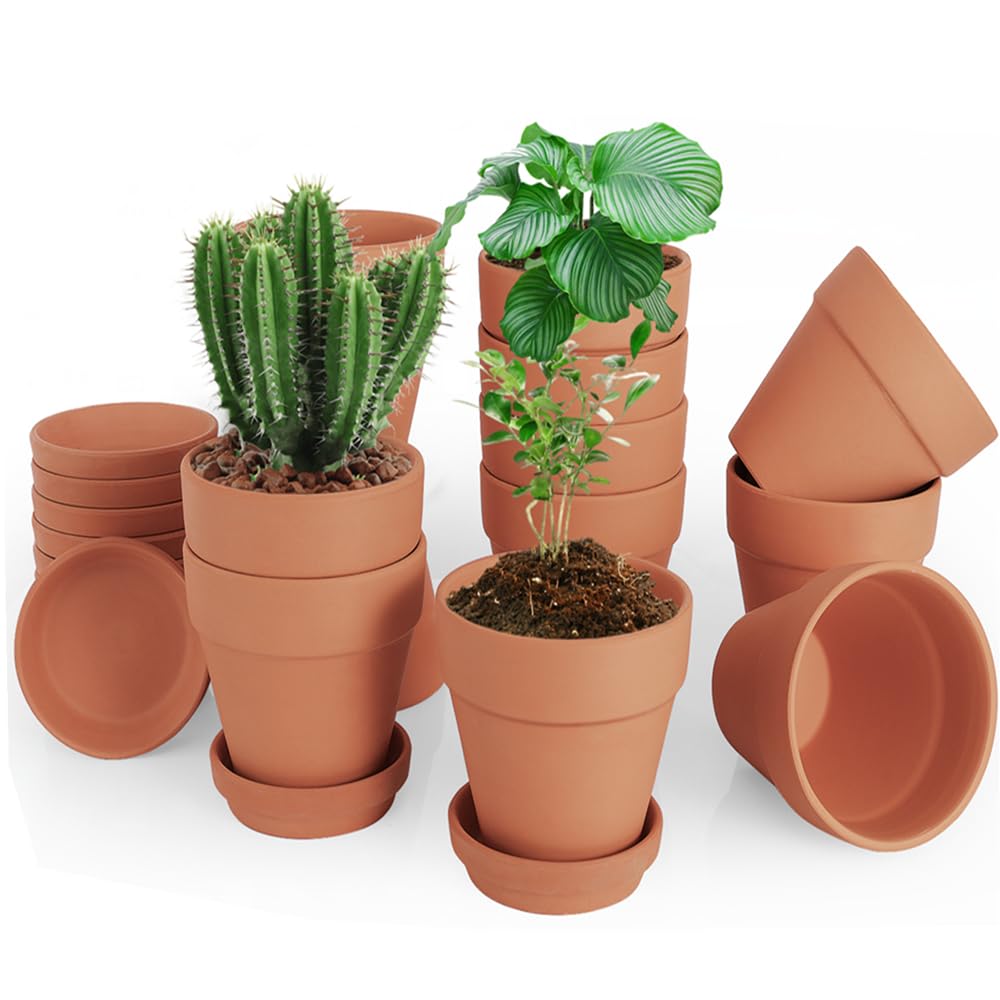 CUZZME 4-inch clay pot with saucer on windowsill for indoor plants.