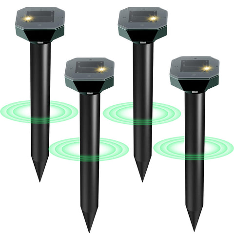Cvtayn snake, mole, rabbit, and skunk deterrent in solar-powered yard setup.