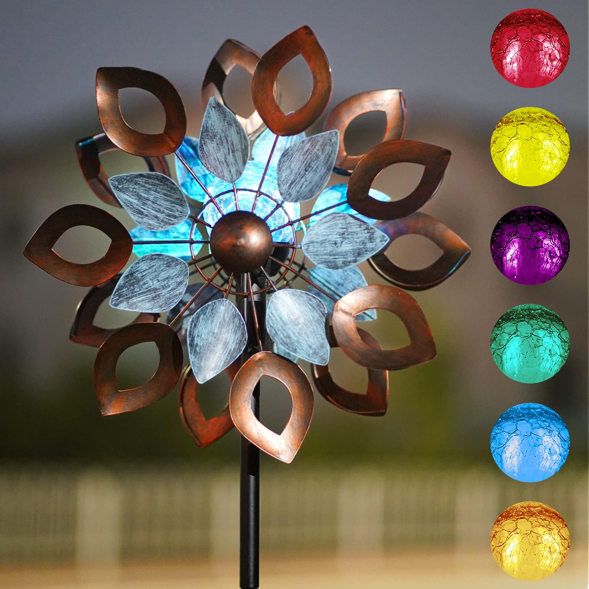 Cyan Oasis copper wind spinner assembly in garden offers quiet motion.