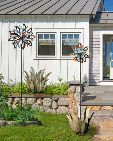 Cyan Oasis metal agave plant at dusk glows with warm outdoor presence