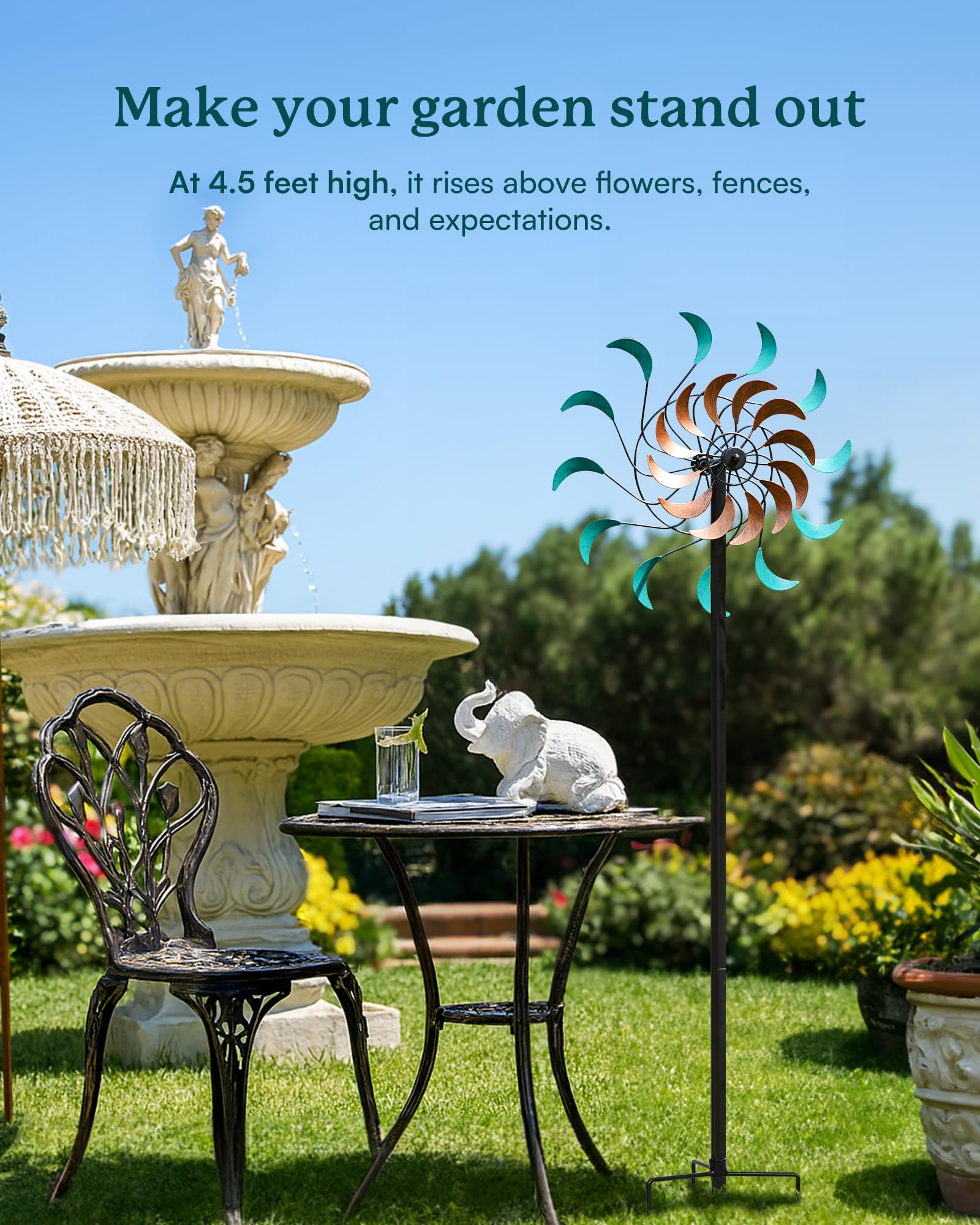 Cyan Oasis metal windmill sculpture brightens the garden with motion.