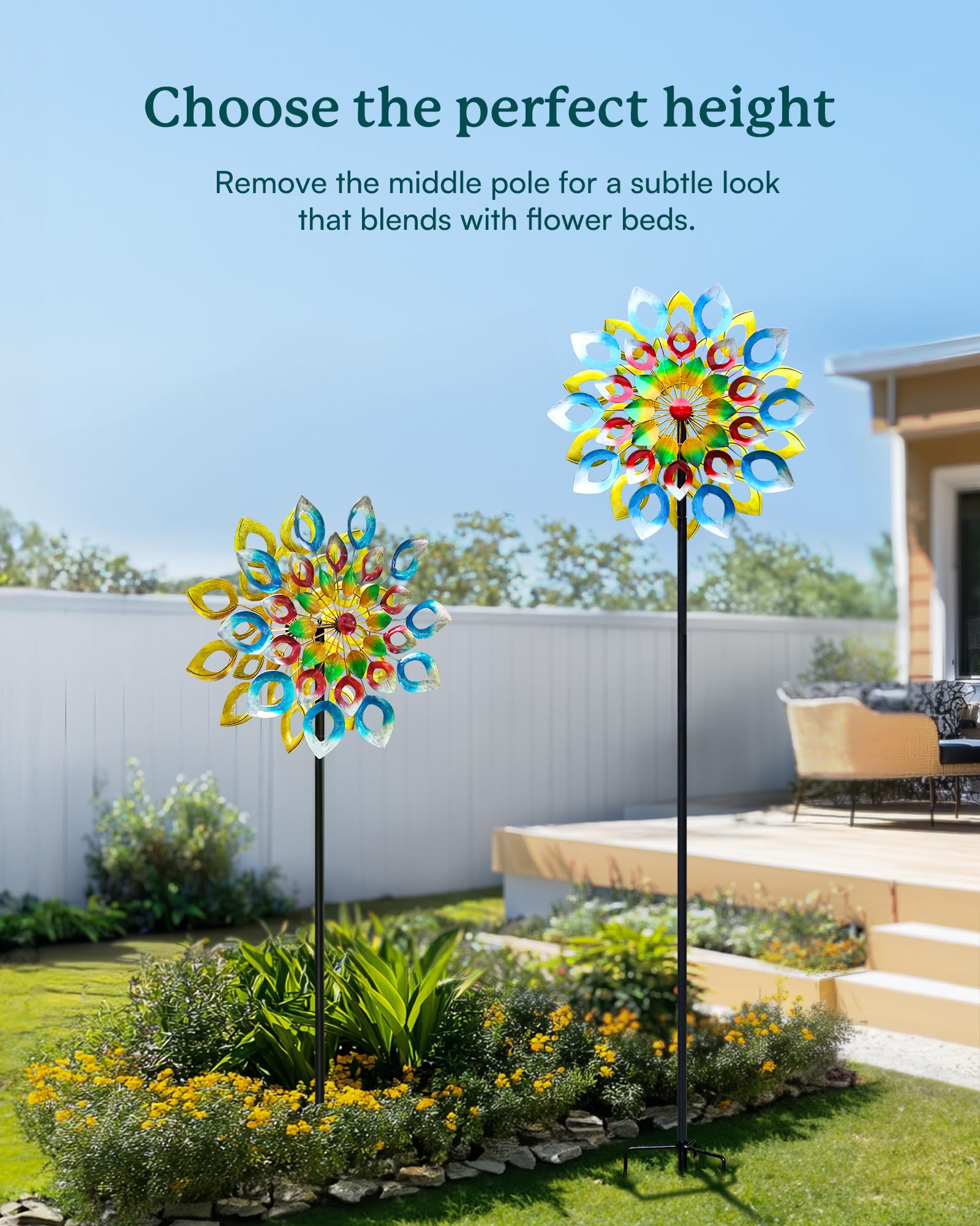 Cyan Oasis wind spinner with three prong stake stays planted
