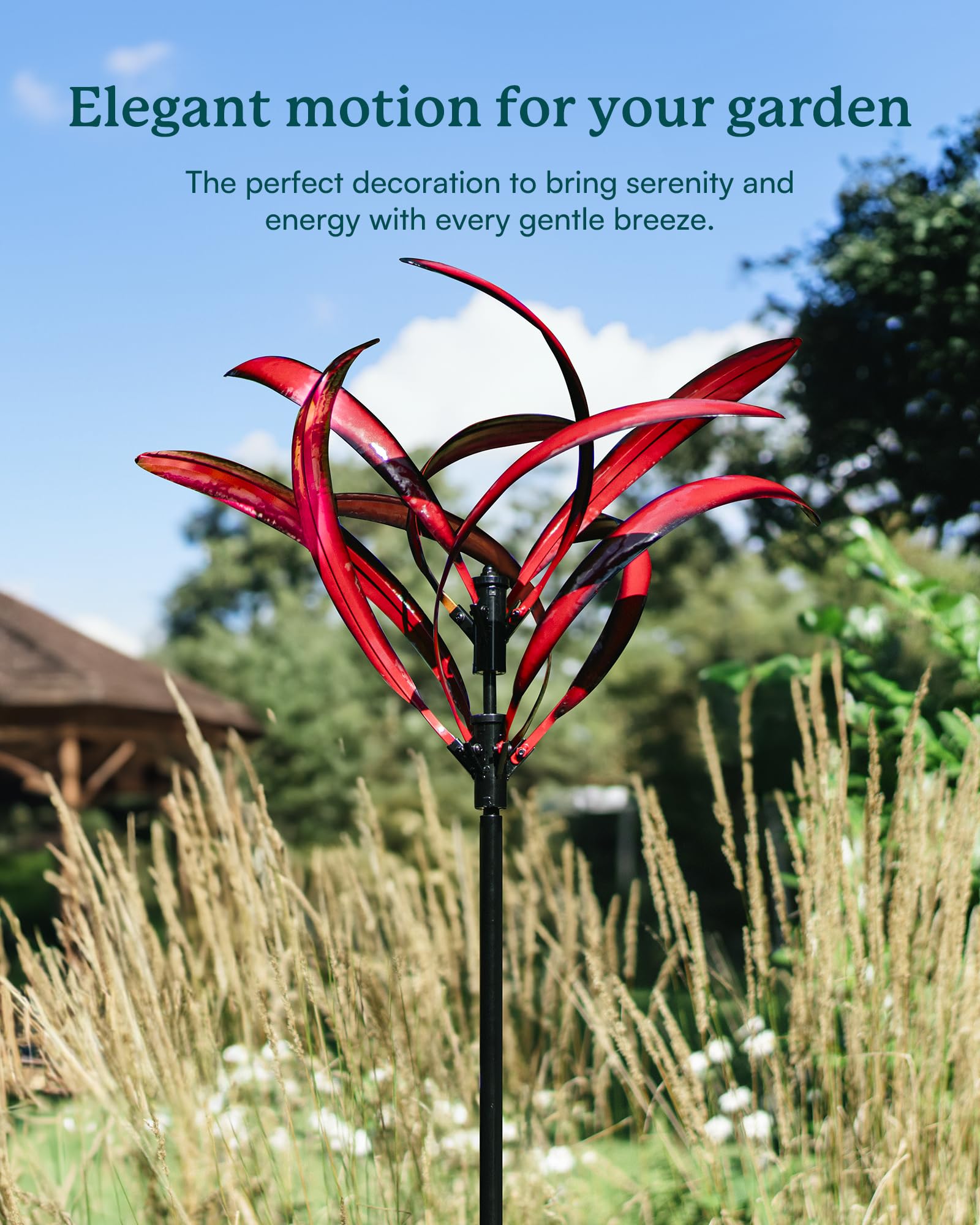 Cyan Oasis sturdy three-pronged stake keeps spinner stable in wind.