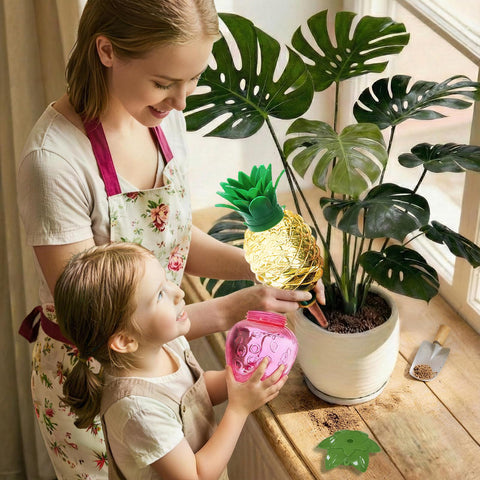 Cynevaris pineapple watering globe provides steady moisture for indoor herbs and flowers.