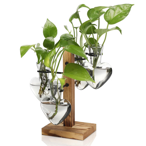 CYZglass love bulb vase on wooden stand showcases vibrant colors for indoor decor.