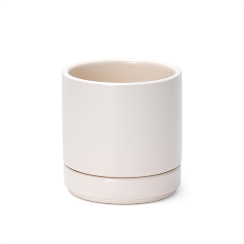 D'vine Dev 4.7-inch oatmeal ceramic planter with drainage hole, ideal for moisture control.