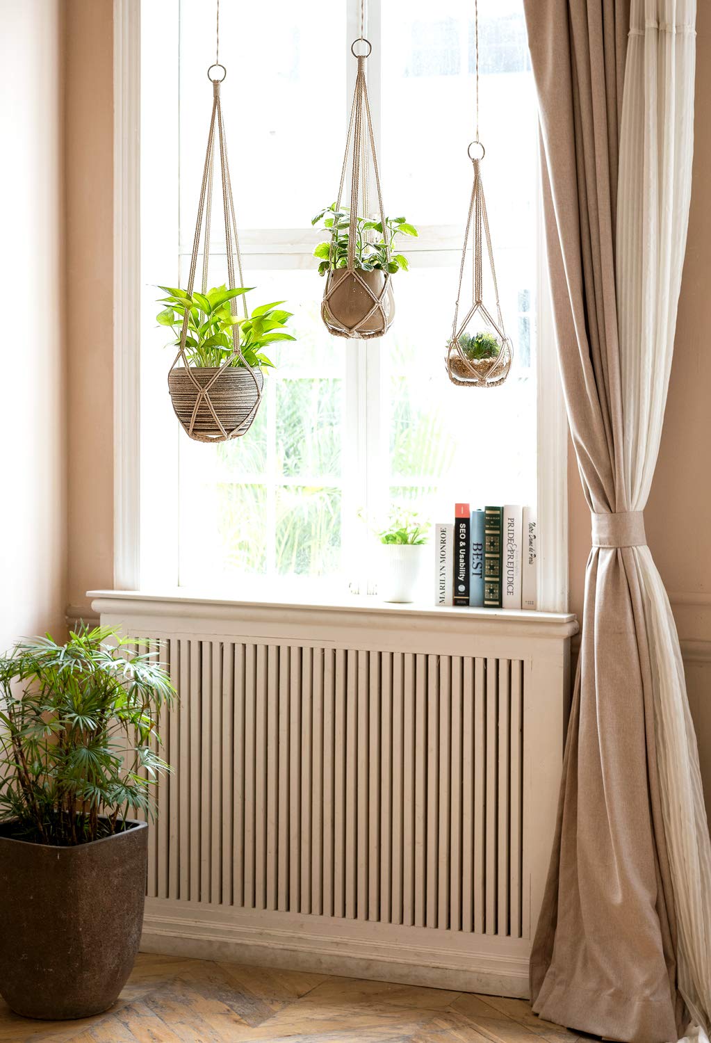 Dahey macrame plant hanger 29inch cream ideal for medium pots and elevated living room display.