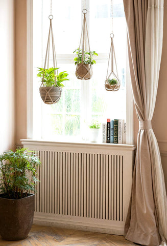 Dahey macrame plant hanger 29inch cream ideal for medium pots and elevated living room display.