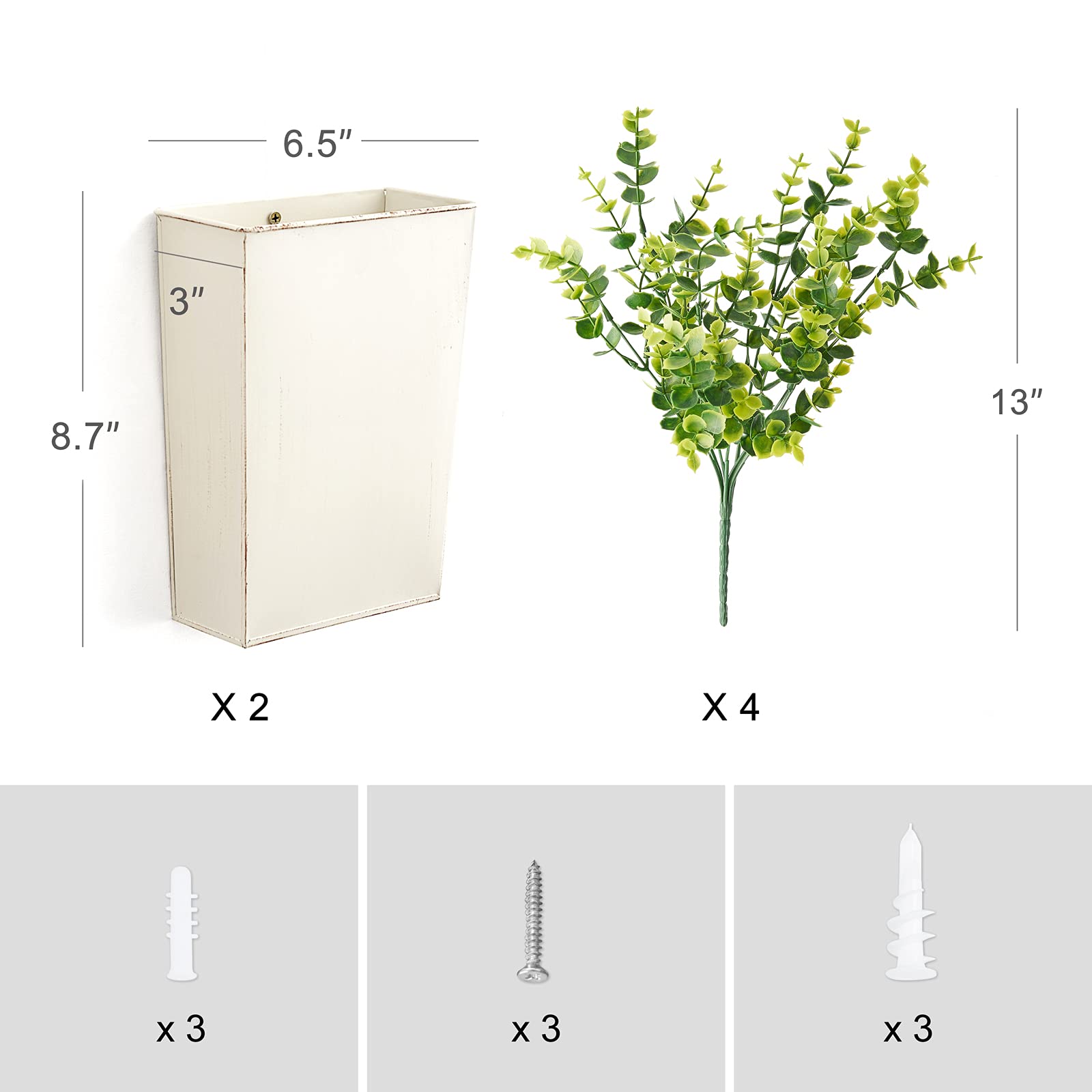 Dahey pair of planters used as table-top display with greenery.