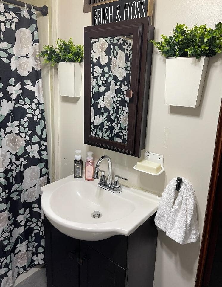 Dahey wall planters shown mounted on a kitchen or living room wall.