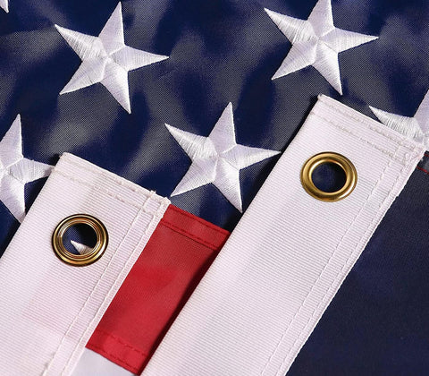 DANF FLAG brass grommets close-up for secure pole mounting