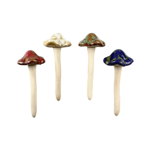 Danmu ceramic mushroom garden ornament adds cheerful color to outdoor spaces.