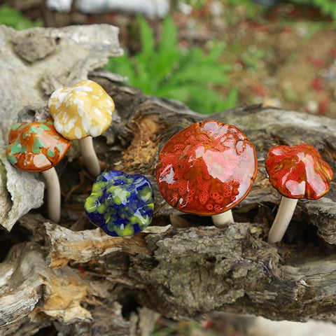 Danmu hand-painted ceramic mushroom creates a unique fairy garden accent.