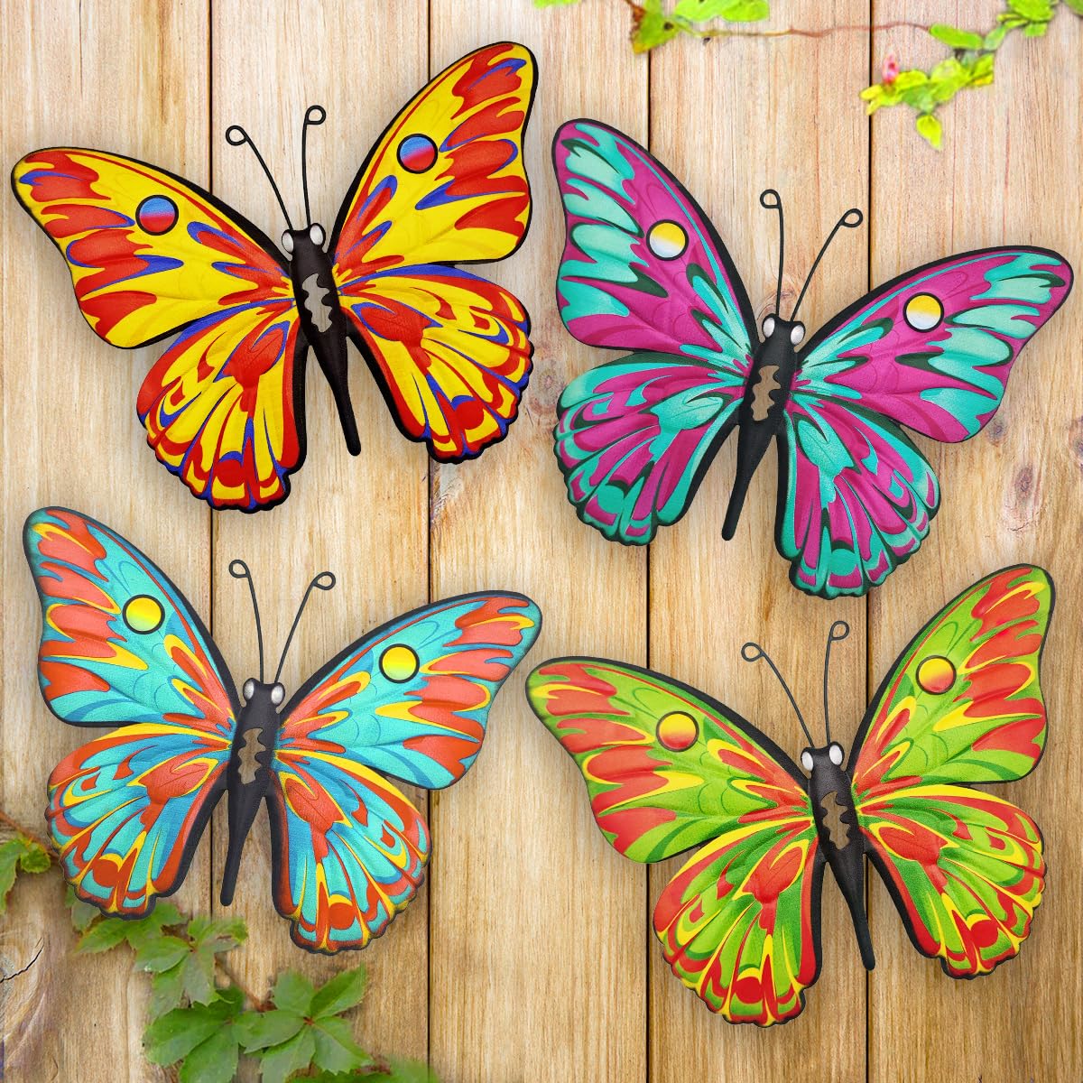 Daogtc four-pack metal butterflies on a sunlit garden fence for outdoor charm
