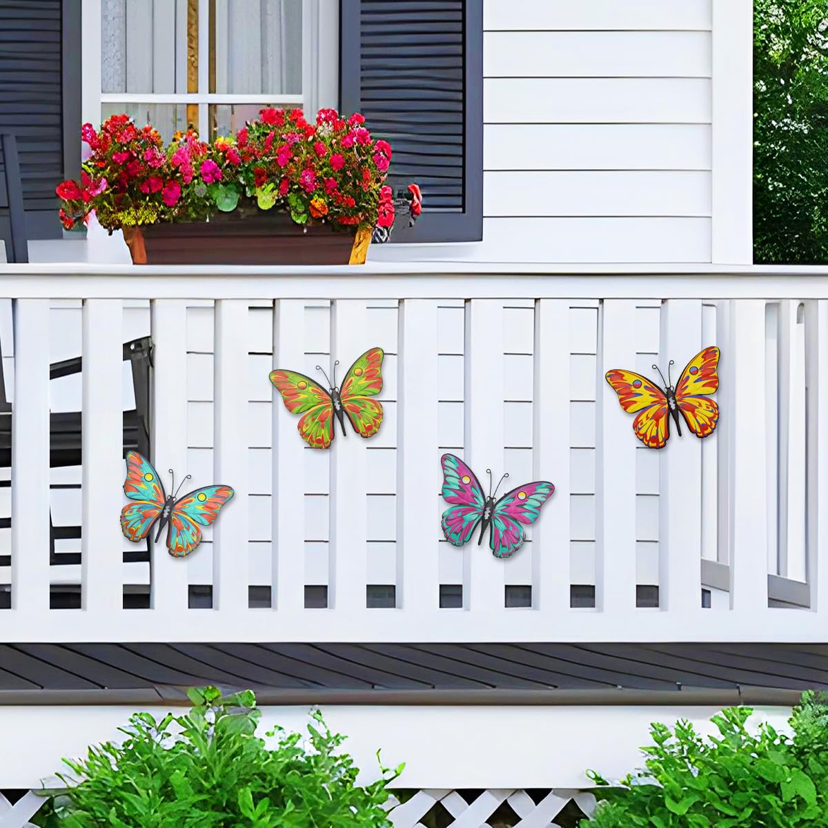 Daogtc four-butterfly display on garden wall adds color