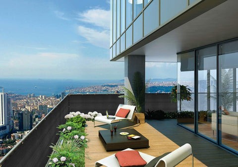 DearHouse screen installed on railing, creating a private balcony space.